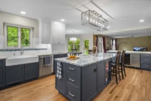 Modern kitchen renovation with custom cabinets and lighting by Designs by D and J in NYC and NJ.